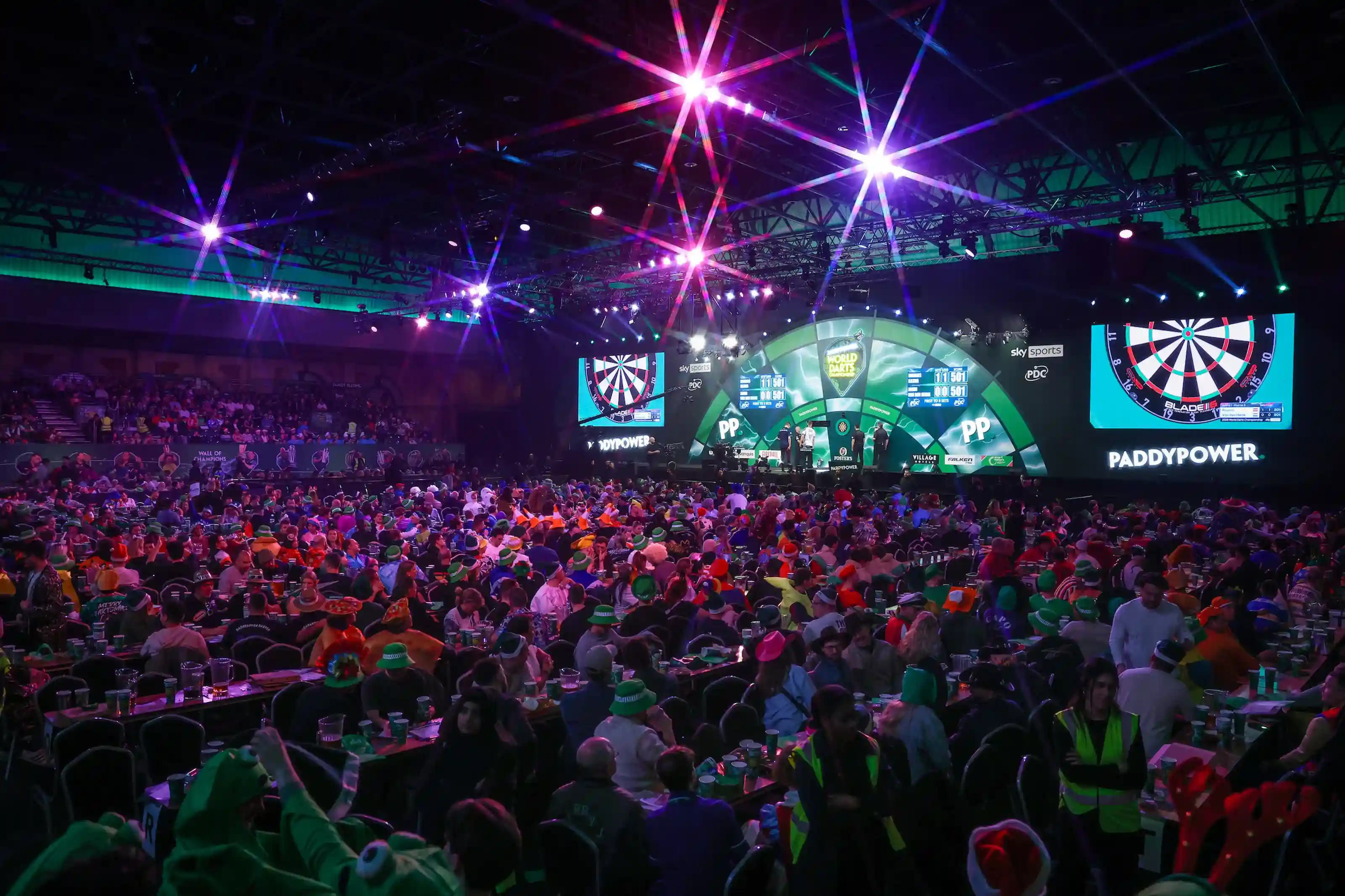 A packed crowd watches the action at the World Darts Championship, Alexandra Palace